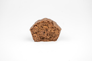 Homemade chocolate brown muffins isolated on white background