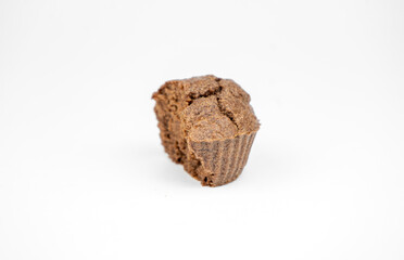 Homemade chocolate brown muffins isolated on white background