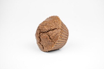 Homemade chocolate brown muffins isolated on white background