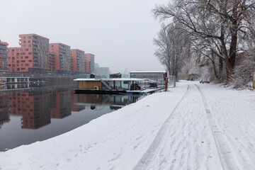 Fototapeta premium Snowy winter Harbor above River Vltava, Holesovice, the most cool Prague District, Czech Republic