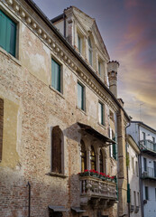 Fototapeta na wymiar Brick facade of a historic building in Treviso, Italy 