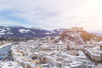 Panorama of Salzburg in winter: Snowy historical center and old city, sunshine