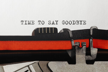 Text Time to Say Goodbye typed on retro typewriter