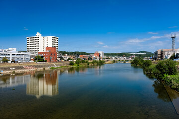 Fototapeta na wymiar 岐阜県多治見市 昭和橋から眺める土岐川と多治見の街並み