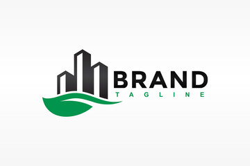 city building leaves green logo