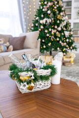 Luxury rich expensive apartment interior in light colors. Stylish contemporary minimalistic design. Full of sun light. A lot of space decorated with Christmas tree