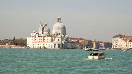 Fototapeta na wymiar View of the Church of Santa Maria della Salute from the boat. Venice. Italy