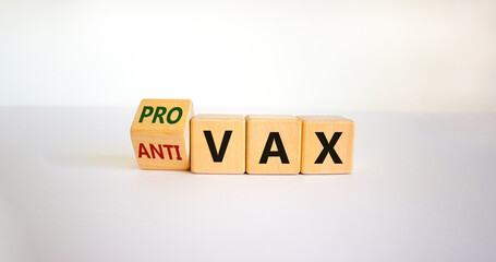 Pro-vax or anti-vax symbol. Turned a cube, changed words 'anti-vax' to 'pro-vax'. Beautiful white background. Copy space. Business, medical covid-19 pro-vax or anti-vax concept.