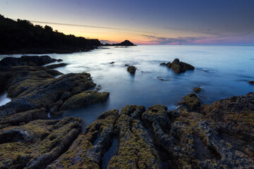 Fototapeta na wymiar Sunset from the coast of Biscay in Mundaka (Basque Country - Spain)