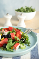Tasty crab stick salad served on table, closeup