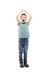 Funny shocked fascinated young boy with Easter bunny ears hat screaming and looking at camera. Full length isolated on white background.