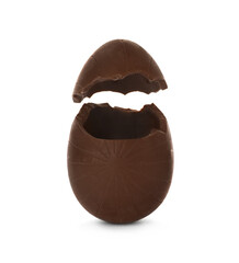 Broken milk chocolate egg on white background