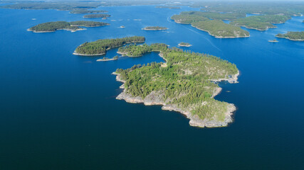 Aerial view of beautiful islands with green trees and rocks on the baltic sea. Saaristomeri,...