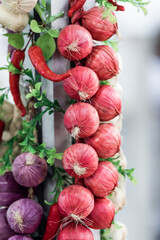 Bunch of red and beige traditional german handcrafted plats of onions