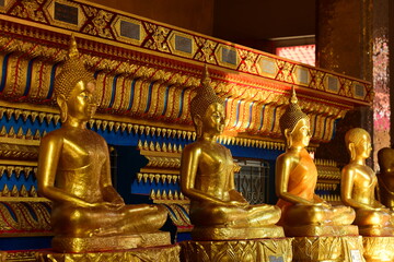The golden Buddha image. Reverence in Buddhist sutras At Wat Luang Pothit, Thailand