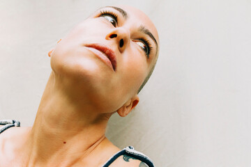 Young woman with shaved head