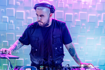 DJ putting music for people to dance