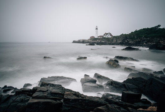 Foggy morning off the shore of Maine with the Portland Head Light