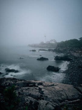Foggy morning off the shore of Maine with the Portland Head Light