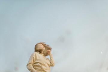 portrait of a young  woman on a sunny day in autumn