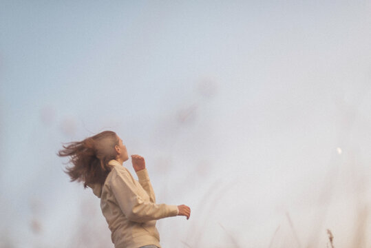 portrait of a young  woman on a sunny day in autumn
