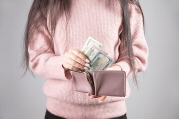 woman hand holding money with wallet