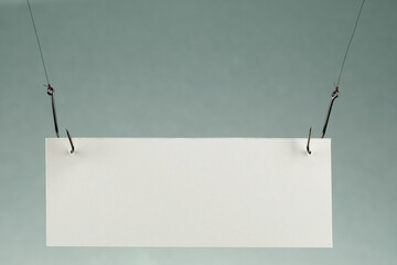 blank piece of paper on a fishhook