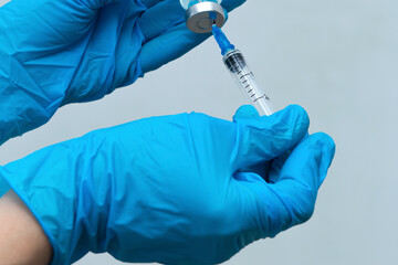 A nurse vaccinates the patient, vaccination