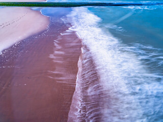 Fototapeta na wymiar Waves motion, long exposure, seaside