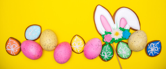 Easter pastry background. Colorful icing Easter cookies, with different symbols and decorations. Traditional easter sweets flat background