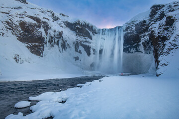 Skogafoss waterfall in a winter sunrise, Iceland