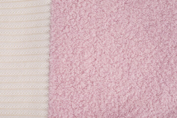 White knitting pink wool texture background. Close up