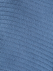 Fototapeta premium White knitting wool texture background. Close up