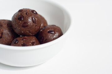 chocolate energy balls on white background