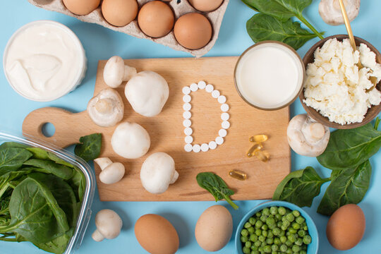 vitamin D. A set of foods with vitamin D on a blue background