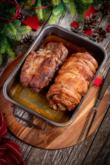 Baked bacon roulade and roasted pork neck.