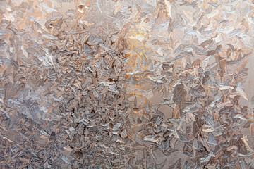 a winter window covered by frost