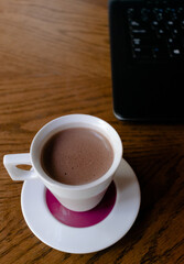 Hot chocolate in brown table