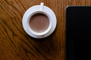 Hot chocolate in brown table