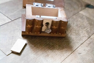 Secret hide open of a handmade wood box.