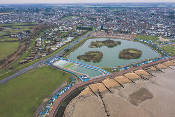 Fototapeta premium Beach Huts at Brightlingsea, Essex, UK drone 