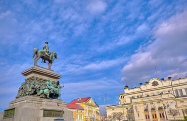 Fototapeta premium Statue of Tsar Alexander II in center of capital city of Bulgaria: Sofia. Statue with blue sky background during sunny day. 