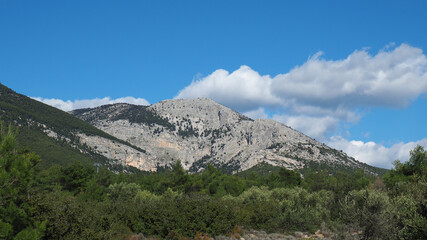 Beautiful mountain of Parnitha on a winter cloudy morning with clear blue sky, Attica, Greece