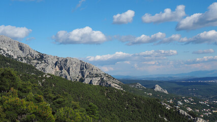 Obraz premium Beautiful mountain of Parnitha on a winter cloudy morning with clear blue sky, Attica, Greece
