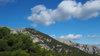 Beautiful mountain of Parnitha on a winter cloudy morning with clear blue sky, Attica, Greece