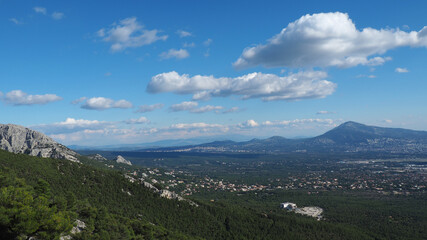 Naklejka premium Beautiful mountain of Parnitha on a winter cloudy morning with clear blue sky, Attica, Greece