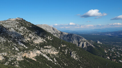 Beautiful mountain of Parnitha on a winter cloudy morning with clear blue sky, Attica, Greece