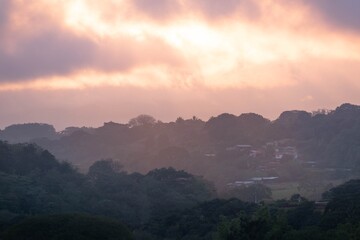 SUNSET IN THE MOUNTAINS WITH PASTEL COLORS IN COSTA RICA