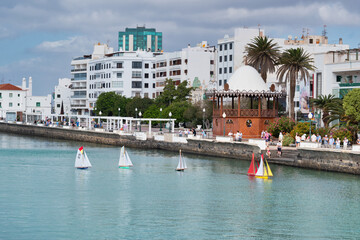 Lanzarote, Spain, February 3, 2020: Photograph of the city of Arrecife and small radio controlled boats on the island of Lanzarote
