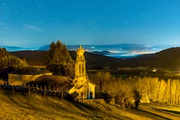 Fotobehang Night sky over a church and cemetery in Spain © jcami